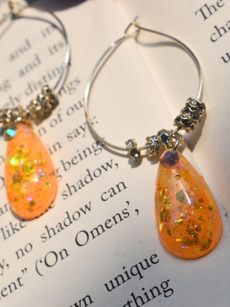 ORANGE-TEARDROP-HOOP-EARRINGS-1.jpg